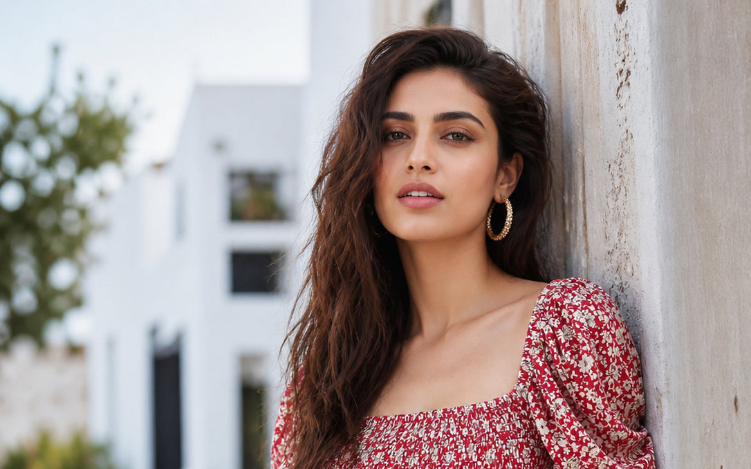 A puff sleeve smocked top — volume above, which sets the rule for everything below